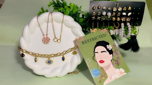 A Gift Of Warmth Combo for her ( 1 Magnetic Clover transform Rose Gold Necklace , 1  Double Heart Love Spark Necklace , 1 Gold Evil Eye Charm Bracelet ,1 set of Butterfly and Luxe Earrings , 1 Love Card , 1 Hershey Kisses